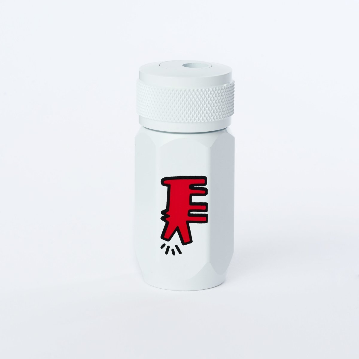 Front-facing image of the sharpener standing upright, highlighting the red dog graphic.