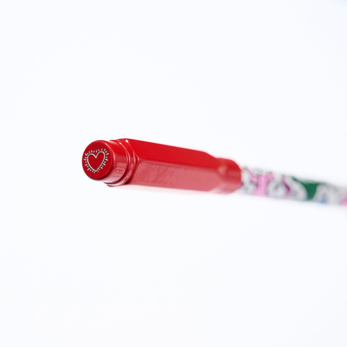Angled view highlighting the red point guard’s engraved heart design.