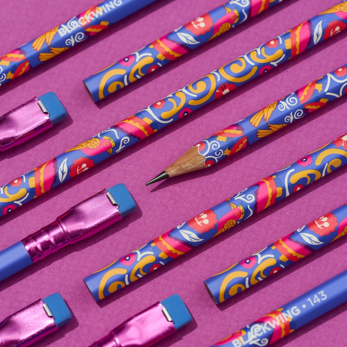 Sharpened Blackwing Volume 143 pencil on magenta