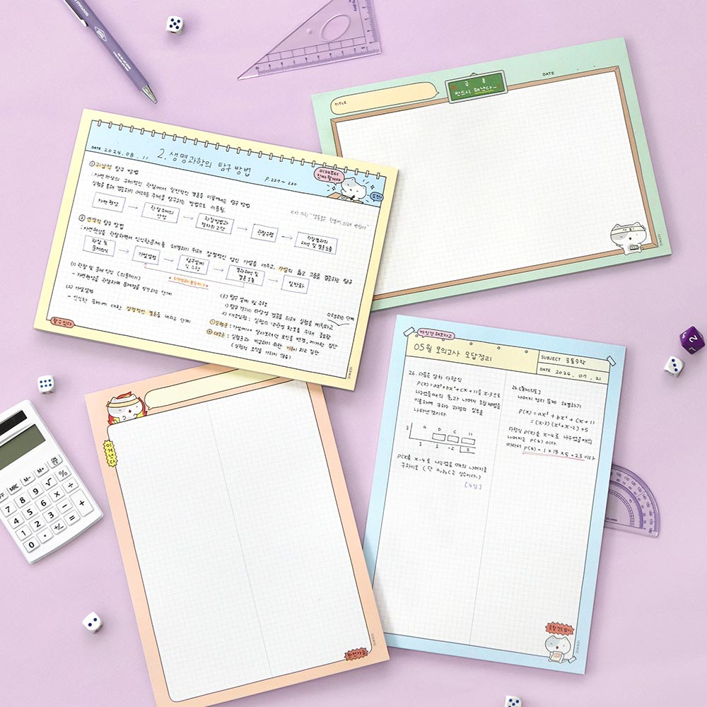 Iconic B5 Blah Blah Memo Notepads in assorted pastel colours displayed on desk with stationery.