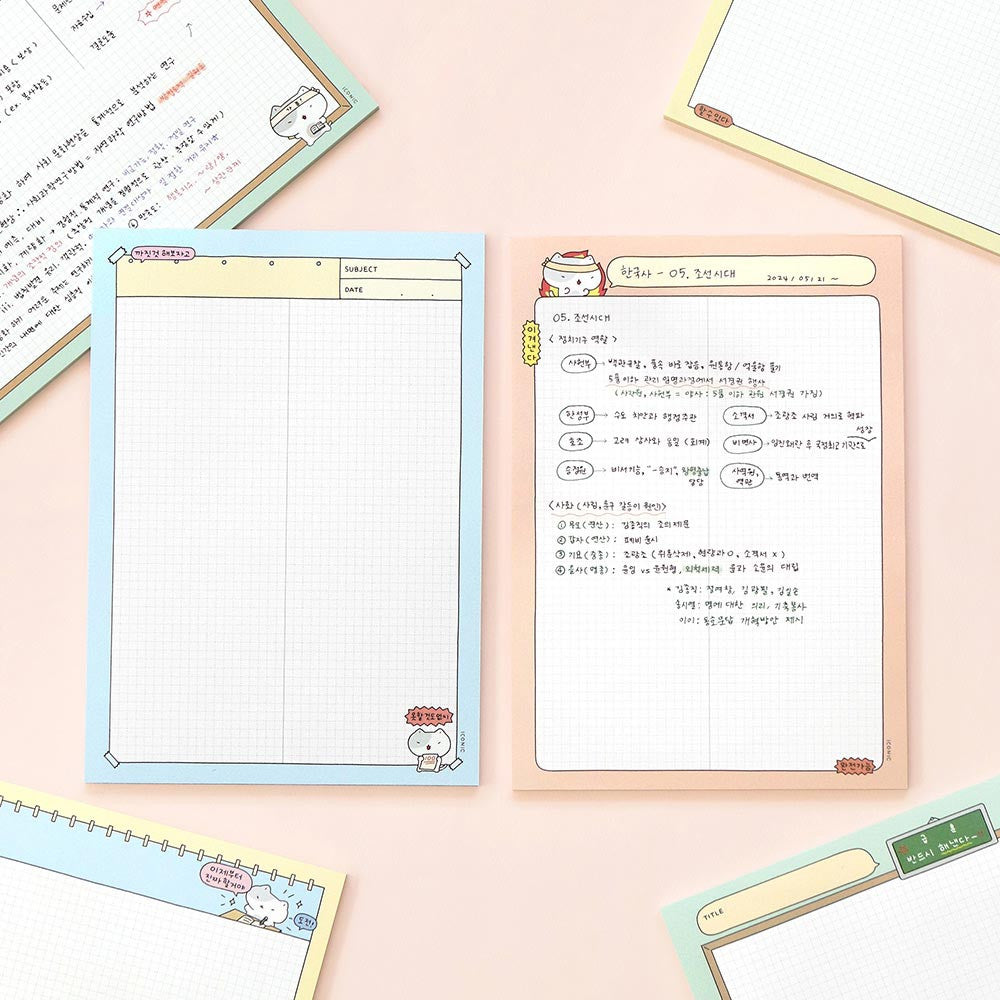 Iconic B5 Blah Blah Memo Notepad open showing ruled writing space and colourful border design.