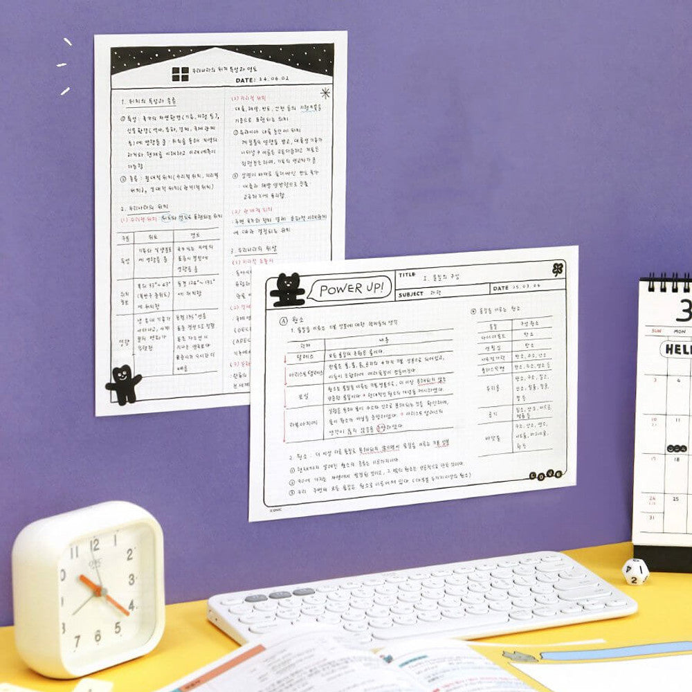 Iconic B5 Doodle Grid Notepad black cover version open showing squared grid layout.