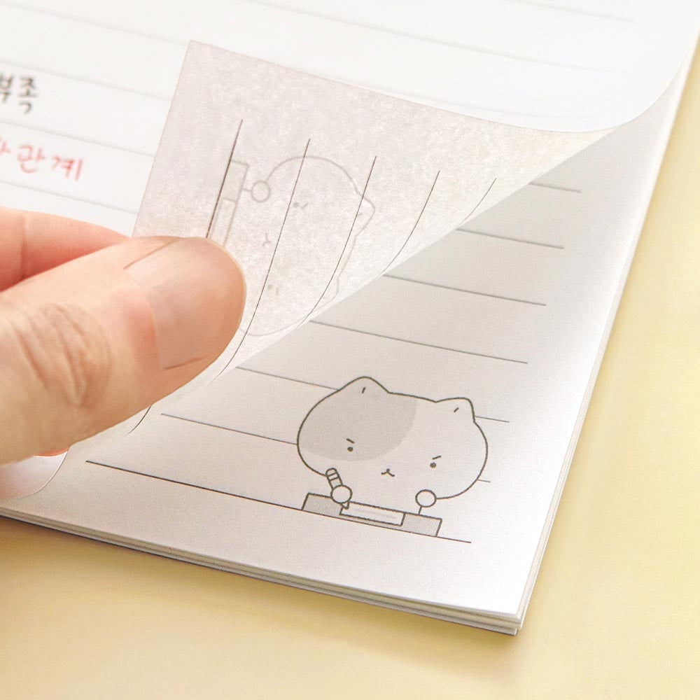 Iconic Blah Blah Spiral Lined Notebook open to show lined pages with small doodle illustration in corner.