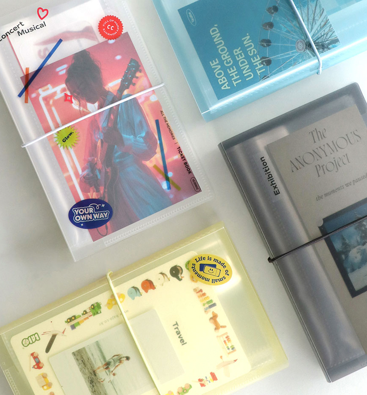 Iconic Collect Ticket Book 64 pockets being filled with tickets and keepsakes.