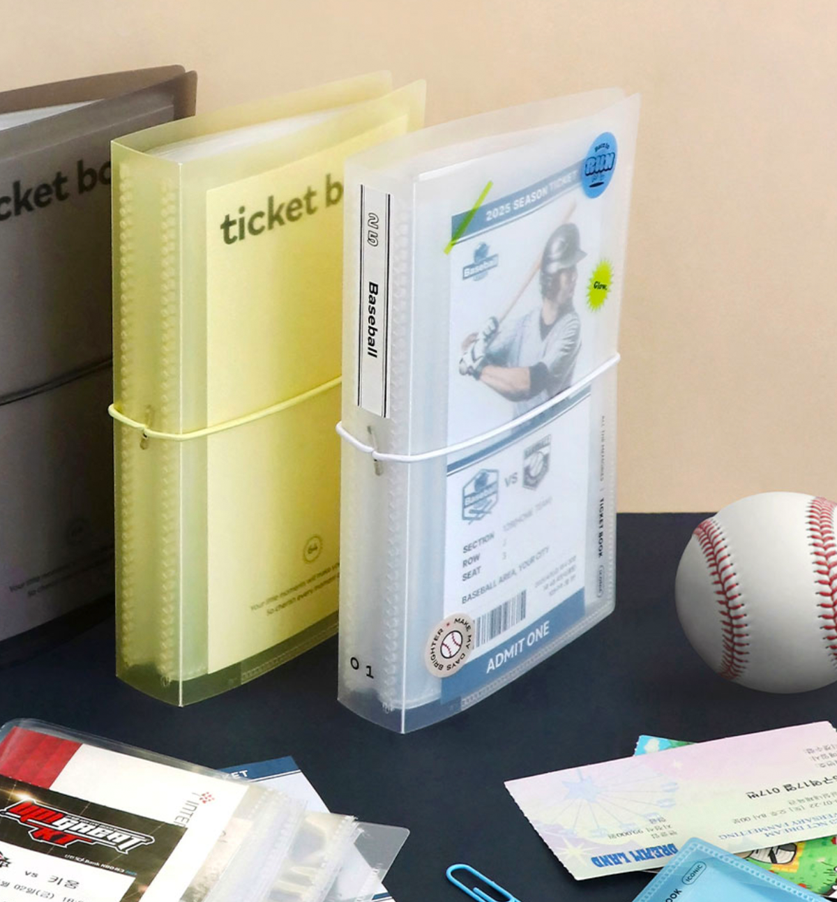Iconic Collect Ticket Book 64 pockets displayed upright in pastel colours.