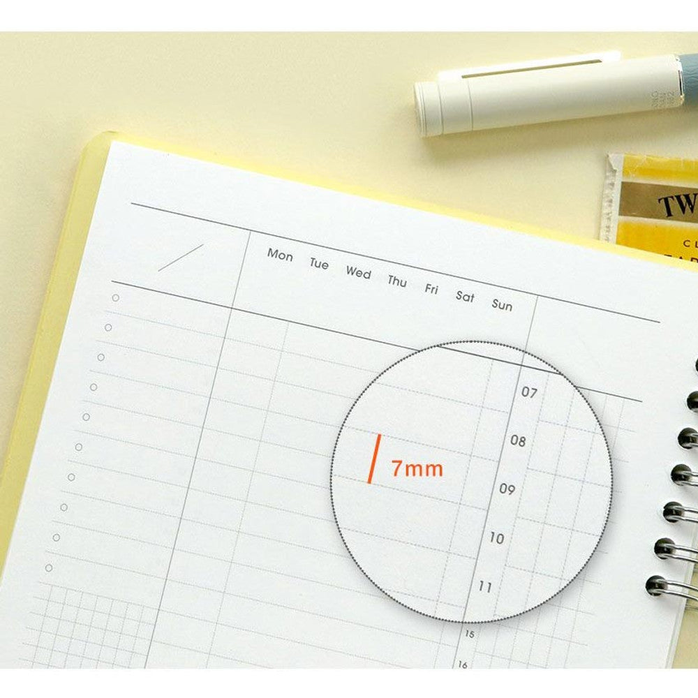 Close-up of the Iconic Daily A5 Study Planner's interior layout, featuring a time-tracking wheel and structured daily schedule for focused planning.