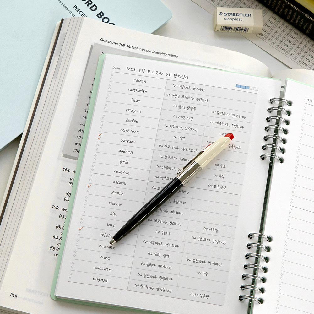 Iconic Daily A5 Word vocabulary notebook open on desk with pencil.