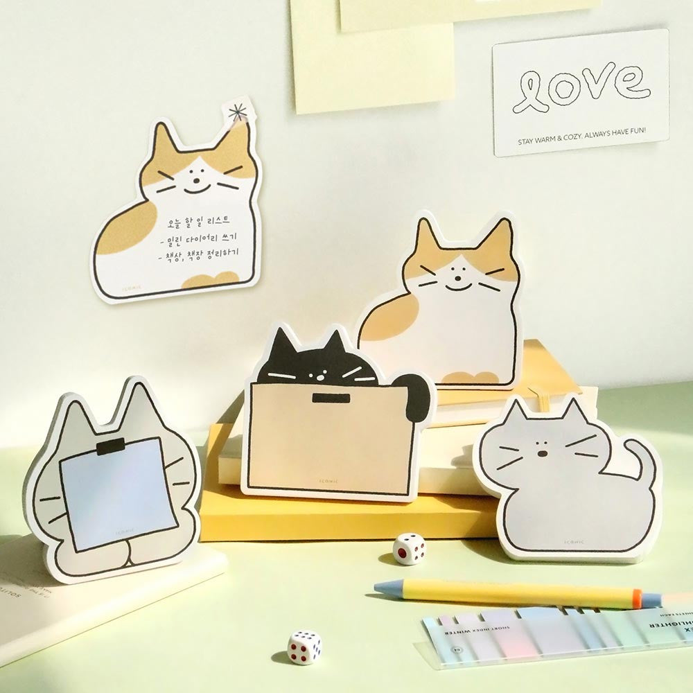 Iconic Doodle Cat Memo Pad cute tear-off notepads displayed in assorted pastel designs with cartoon illustrations.