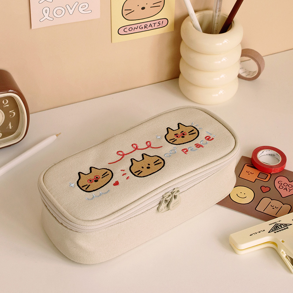 Iconic Doodle Printed Large Capacity Pen Case cream design with doodle characters shown on beige background.